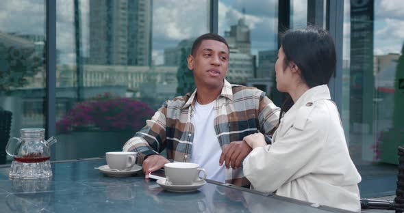 Young Woman Consoles Her Friend Feeling Frustrated After Reading the Worst News on a Cell Phone alt