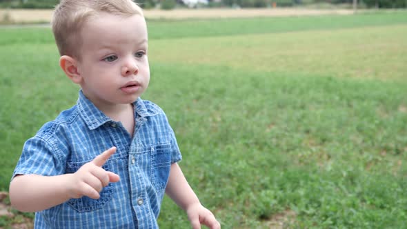 Attractive Cute Young Child Boy Running With Fun