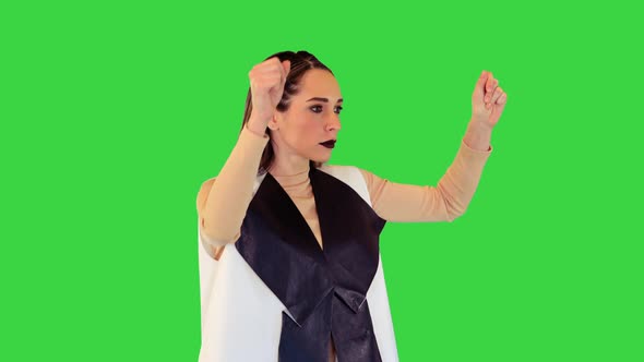 Android Girl Walks and Suddenly Starts to Dance on a Green Screen Chroma Key