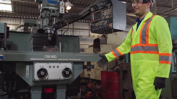 Factory Workers Handshake with Team Member in the Factory alt
