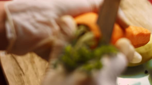 The Cook Peels the Carrot in Very Pleasant Atmosphere alt