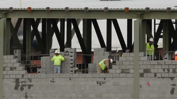 Construction Workers Build Wall Timelapse alt