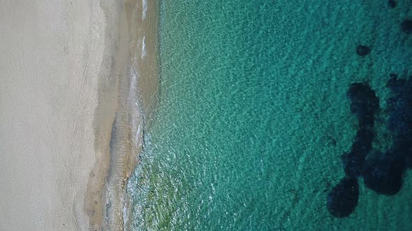 Mylopotas on the island of Ios in the Cyclades in Greece seen from the sky alt