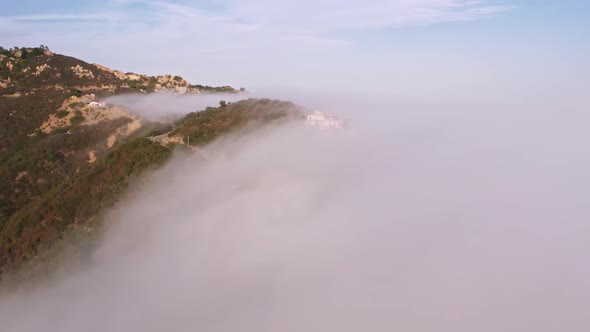 Drone Flying Fast Through White Clouds at Sunset Aerial Mountains Landscape alt
