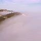 Drone Flying Fast Through White Clouds at Sunset Aerial Mountains Landscape - VideoHive Item for Sale