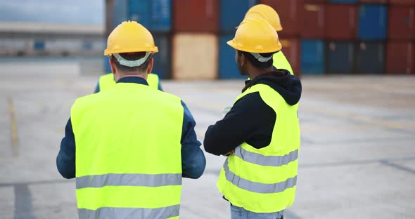Engineer people controlling shipping containers inside industrial port alt