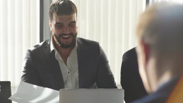Elegant Multiracial Businessmen in Suits Gathered Together for Negotiating alt
