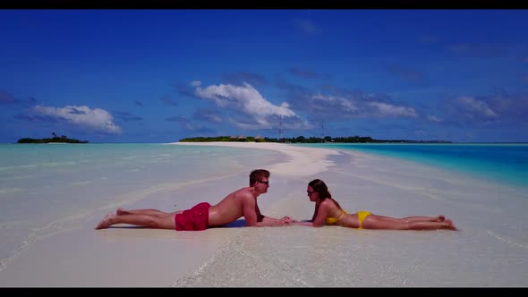 Romantic couple in love on relaxing seashore beach journey by blue sea and white sand background of  alt