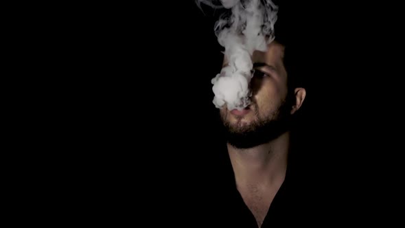 Portrait of a smoking man, Vape. alt