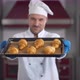 Portrait of Male Chef with Tray of Croissants at Pastry Shop - VideoHive Item for Sale