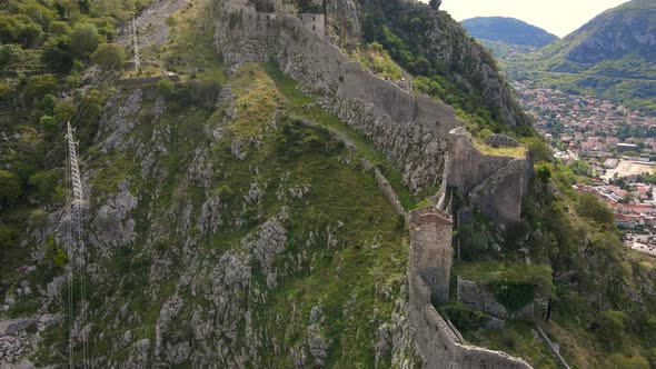 Aerial Shot of the Fortress St John San Giovanni Over the Old Town of Kotor the Famous Tourist Spot alt