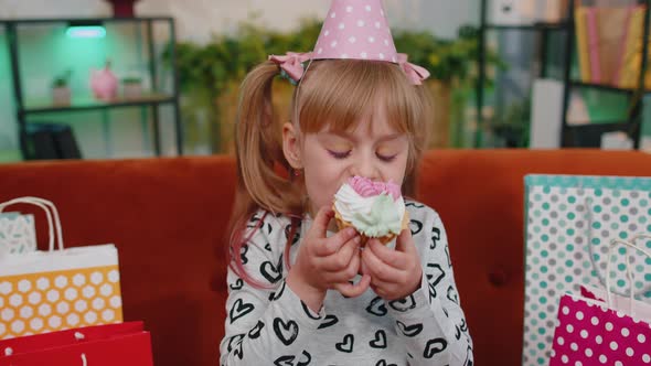 Young Little Children Girl with Lots of Gift Presents Celebrating Birthday Party Eating Dessert Cake alt