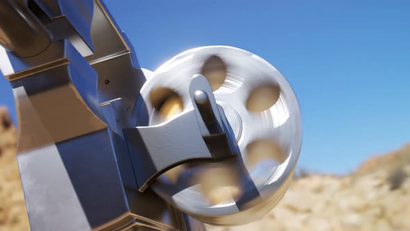 Single golden bullet loaded to a revolver in a game of russian roulette. 4KHD alt