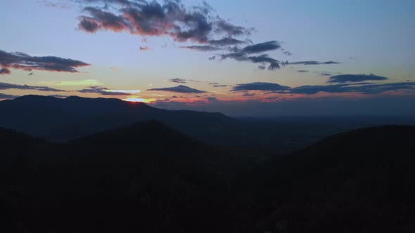 Blue hour. Push in fly through valley in beskid mounatins during sunset.