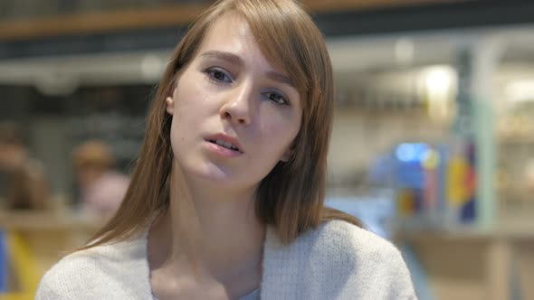 Young Woman Reacting to Failure and Problems, Indoor alt