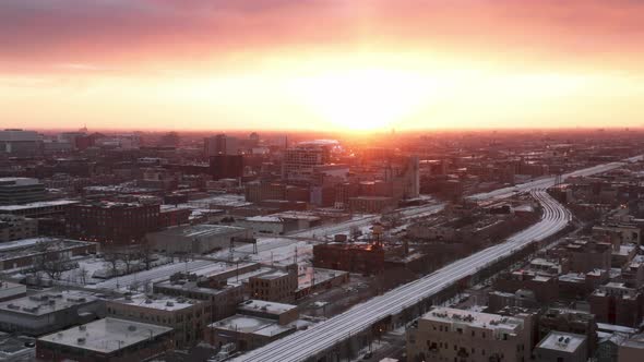 Aerial Sunset Panorama of Chicago Highway Railroad Under White Snow at Winter alt