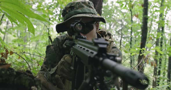 Fully Equipped Rifle Soldier Wearing Camouflage Uniform Attacking Enemy Rifle in Firing Position in alt