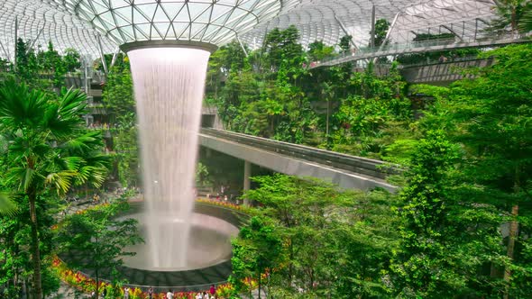 Time lapse Waterfall at Shopping mall Jewel in Changi Airport. alt