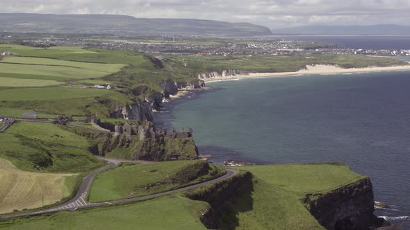 Whiterocks beach and Dunluce on the Causeway Coastal Route, Northern Ireland. alt