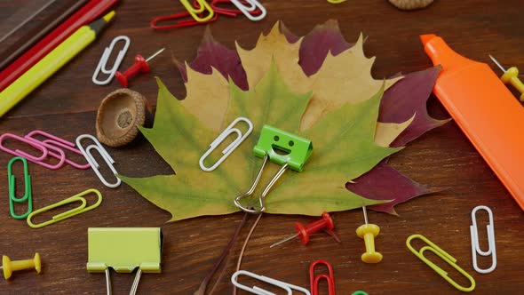 Smiles Binder Clip with Fallen Maple Leaves