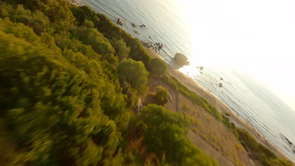 Drone Over Sunlit Landscape And Beach Of Corfu alt