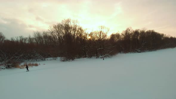 Sunset At The Frozen River
