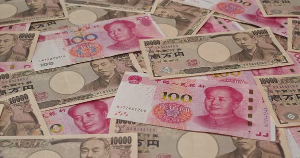 stack-of-rmb-anda-japanese-yen-stock-footage-videohive