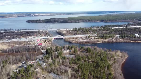 Aerial View of the Vuoksi River, the Forest and the Settlement in Autumn Day, Losevo, Leningrad