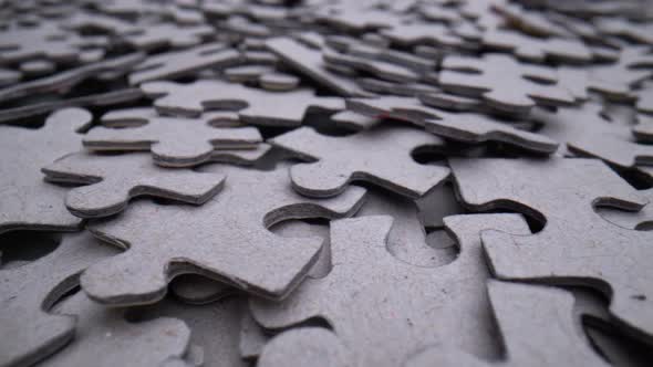 Pile of Randomly Lying Puzzle or Jigsaw Pieces