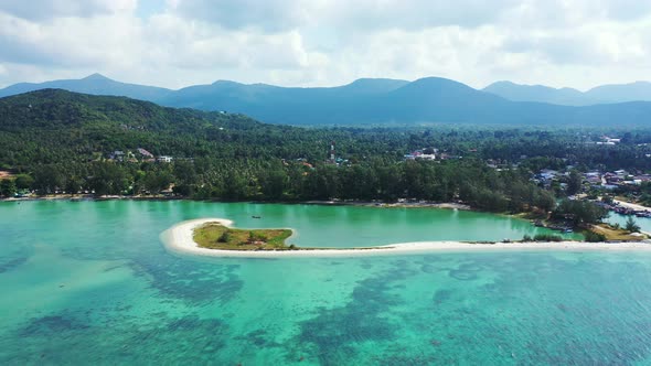 Wide angle overhead island view of a summer white paradise sand beach and aqua blue water background alt