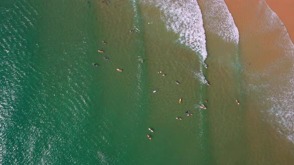 Tourist With Surfing Boards On Tropical Beach Of Noosa National Park Near Noosa Heads In QLD, Austra alt