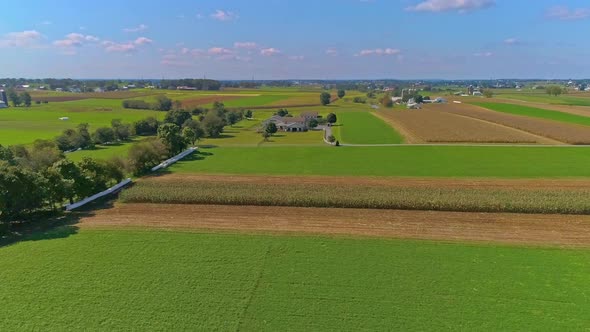 erial View of Rural America of Amish Farmlands With Fields Needing Harvesting alt