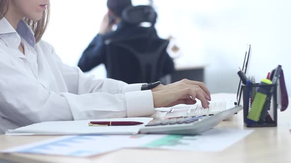 Beautiful Woman Working in a Modern Office