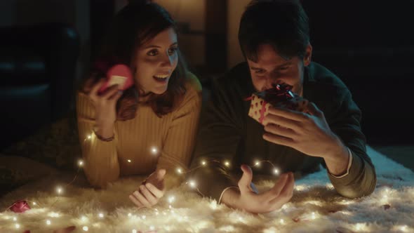 Couple exchanges valentine day gifts alt