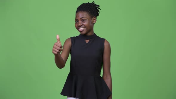 Young Beautiful African Businesswoman Giving Thumbs Up