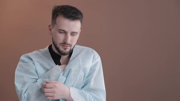 a Sick Person Measures the Temperature By Pushing a Thermometer To the Body, and I Check My Body alt