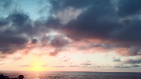 Amazing Aerial View of Beautiful Sunset Over the Ocean alt