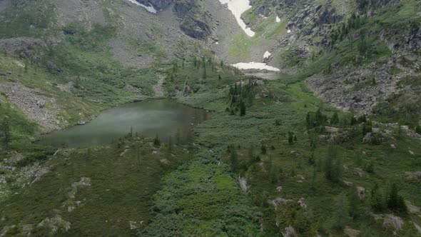 Karakol lakes and green forest in mountains of Altai alt