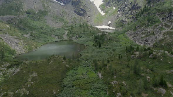 Karakol lakes and green forest in mountains of Altai