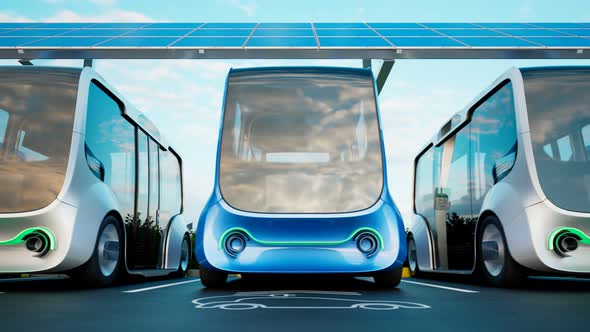 Electric cars charging station. Minibuses stopped to charge the batteries. alt