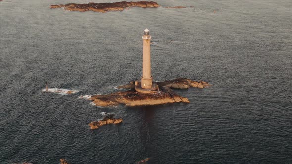 La Hague, France, Aerial  - The Goury Lighthouse at Sunset