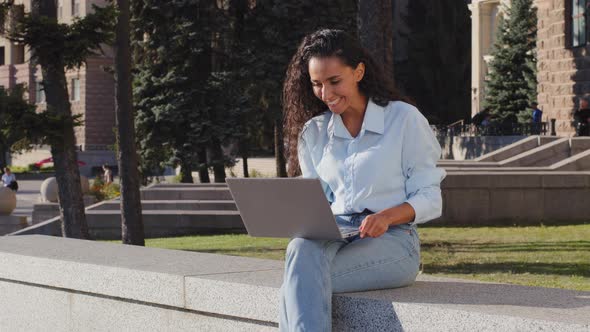 Smiling Happy Cheerful Carefree Young Girl Student Winner Successful Business Woman with Laptop alt