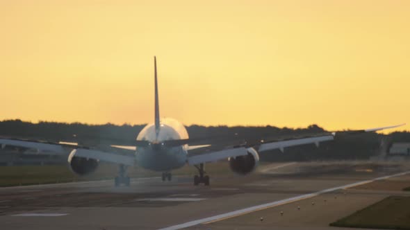 Airplane Landing at the Early Morning alt