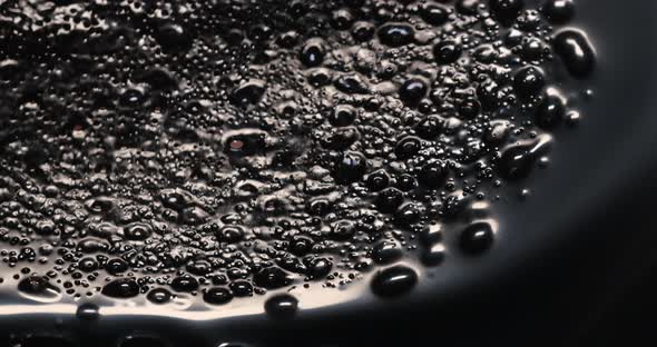 Old film strip burn with bubble.plastic burning bubbles fire closeup 35mm old film alt