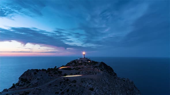 Formentor, Spain, Timelapse - The Lighthouse of Formentor during the blue hour alt
