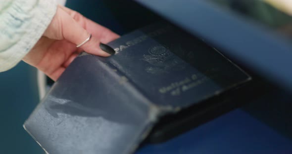 Traveler Is Getting Boarding Pass To Flight  alt