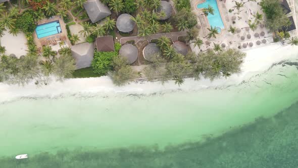 Vertical Video of the Ocean Near the Coast of Zanzibar Tanzania Aerial View alt
