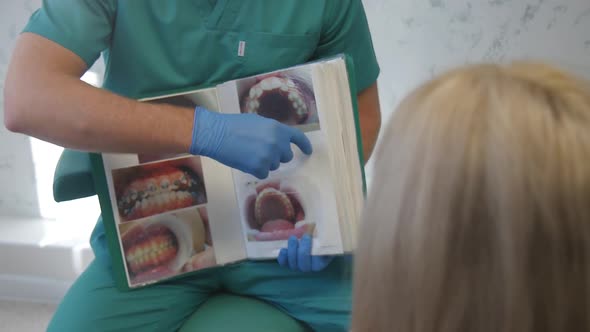 Doctor Shows Teeth Shots To Patient