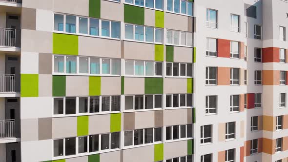 Aerial View. In the Frame Is the Facade of an Apartment Building. Cheap Multi-storey House with alt
