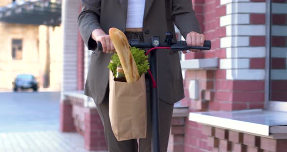Nodern Woman On Electric Scooter alt